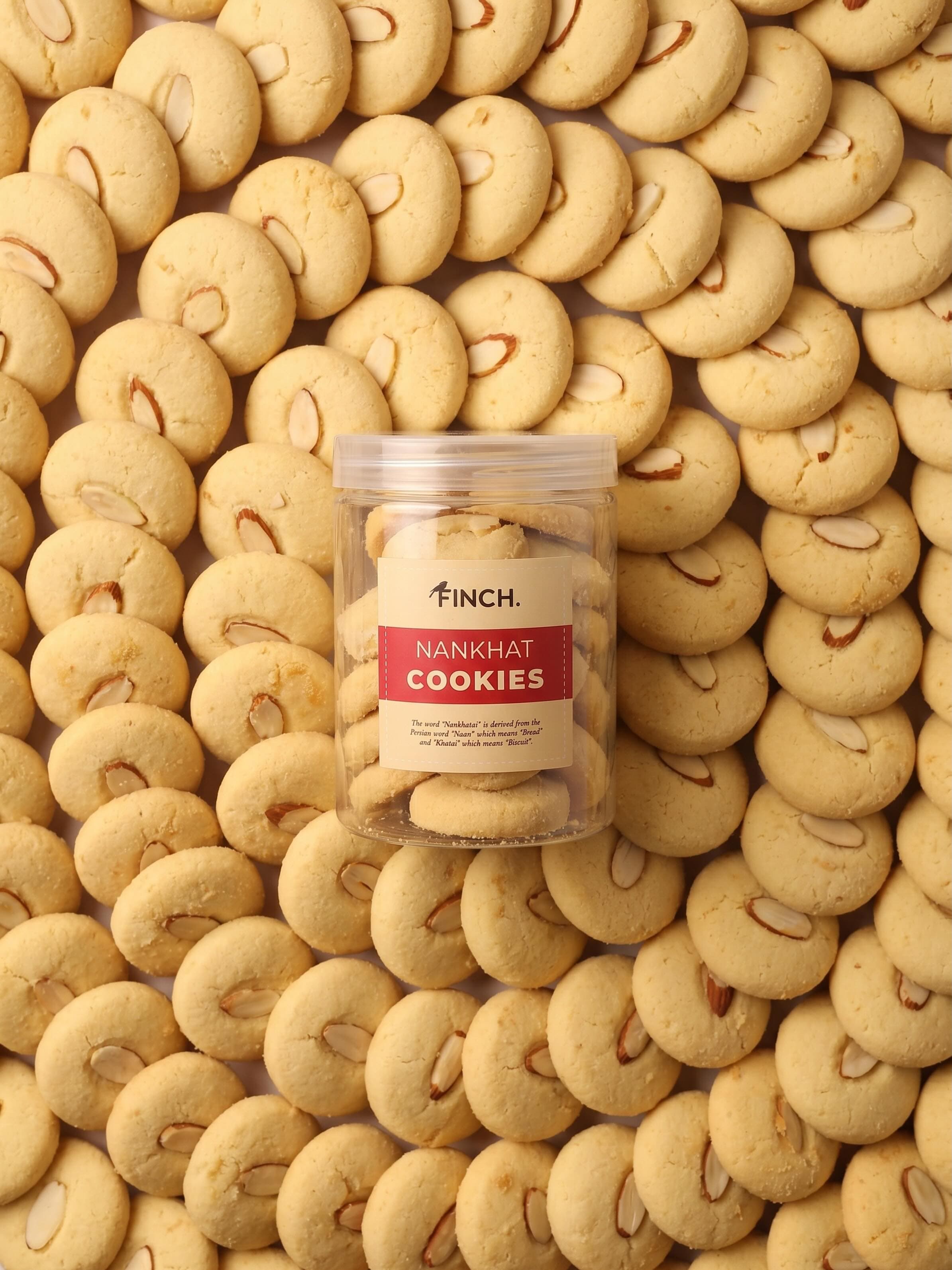Finch cookie jar surrounded by butter cookies